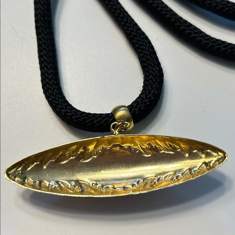 Gold Tone Geometric Engraved Pendant on Black Cord  Necklace‎ 36 Inch